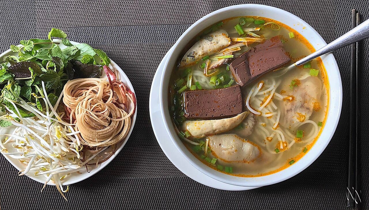 Source photograph of Bún bò Huế. Not official I Want Some Food pixel artwork.