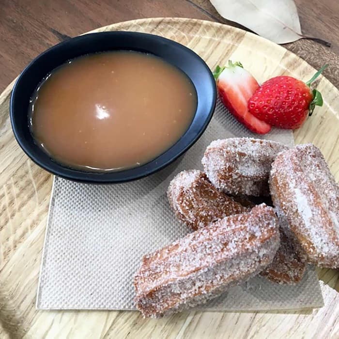 Source photograph of Chocolate churros with chocolate & salted caramel sauce
