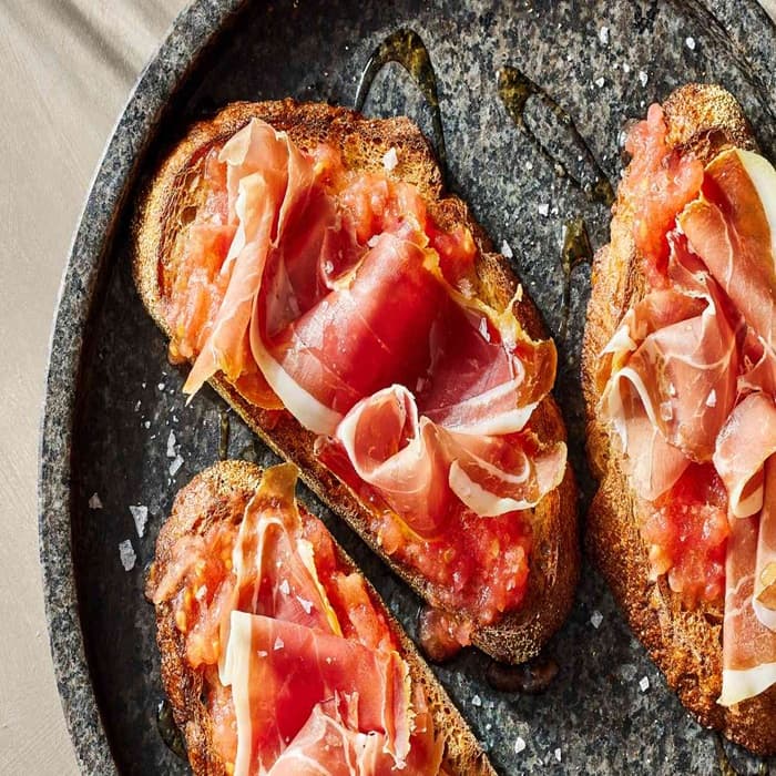 Source photograph of Spanish tomato bread with jamón Serrano