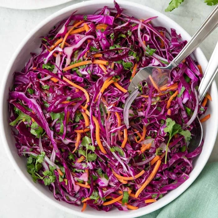 Source photograph of Tangy carrot, cabbage & onion salad