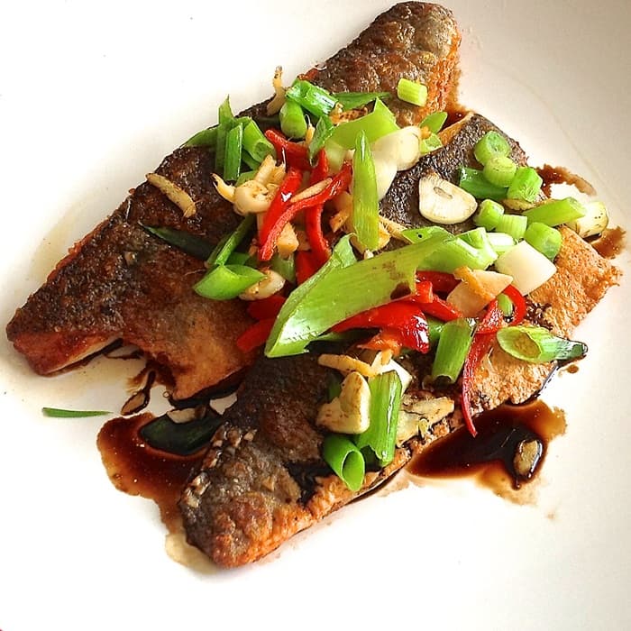Source photograph of Sea bass with sizzled ginger, chilli & spring onions