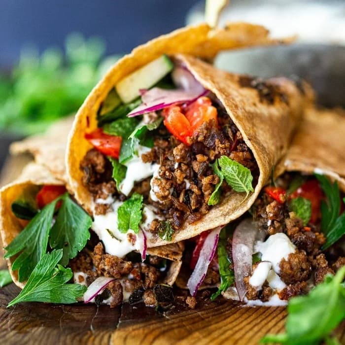 Source photograph of Hot cumin lamb wrap with crunchy slaw & spicy mayo