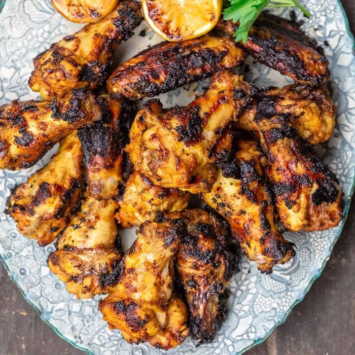 Source photograph of Chicken wings with cumin, lemon & garlic. Not official I Want Some Food pixel artwork.